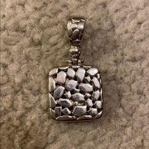 Square pendant pebble looking shapes on front